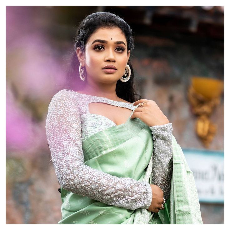 Elegant Silver Vaddanam Designs with Price and the Beauty of a Pista Colour Saree